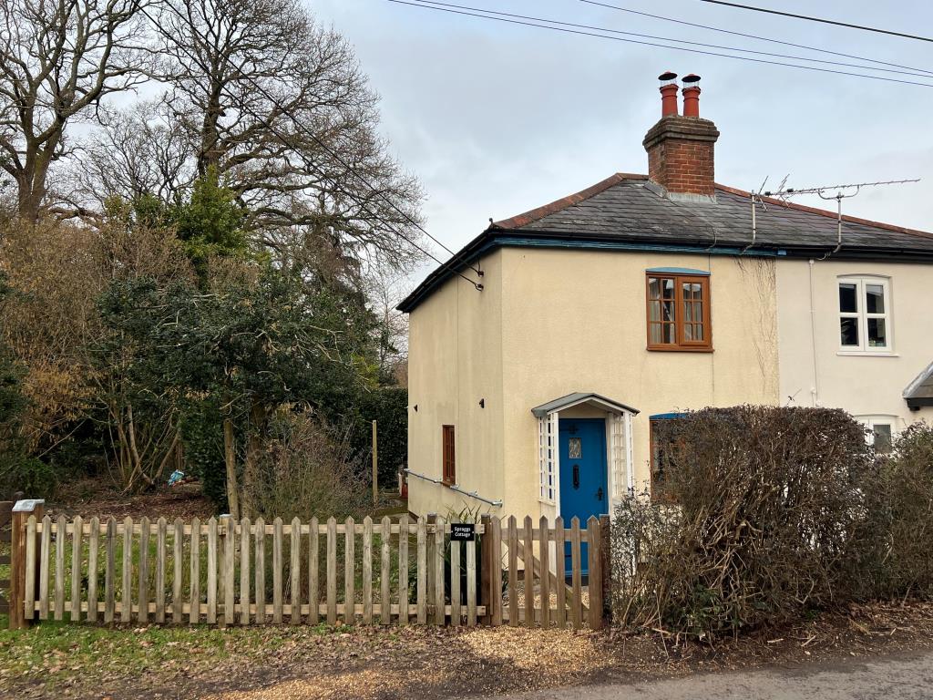 Lot: 84 - TWO-BEDROOM COTTAGE IN NEED OF IMPROVEMENT - Front view of Cottage with large Garden